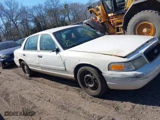 2010 Ford Crown Victoria with VIN 2FABP7AV6AX138688, listed as a IAAI auction lot 41774614 with 999,999 mi miles. Bid and sale history available at carsss.com. Image 12.