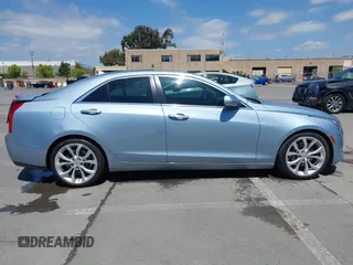 2013 Cadillac ATS Premium with VIN 1G6AE5S31D0152694, listed as a IAAI auction lot 42127294 with 71,882 mi miles. Bid and sale history available at carsss.com. Image 13.