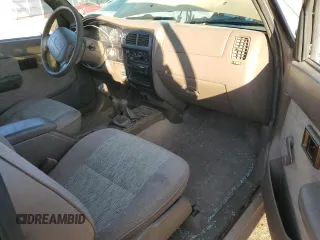 1999 Toyota Tacoma with VIN 4TAPM62N0XZ546880, listed as a Copart auction lot 88327105 with 234,164 mi miles and Salvage Title. Bid and sale history available at DreamBid. Image 8.