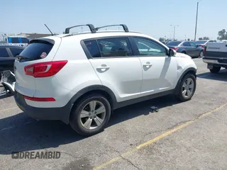 2013 Kia Sportage LX with VIN KNDPB3A23D7514304, listed as a IAAI auction lot 42544397 with 82,456 mi miles and . Bid and sale history available at DreamBid. Image 4.