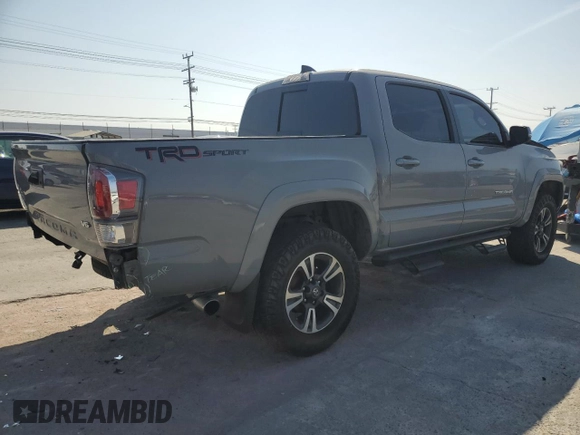 2020 Toyota Tacoma SR5 with VIN 3TMAZ5CN2LM137991, listed as a Copart auction lot 60317895 with 98,054 mi miles and Salvage title. Bid and sale history available at DreamBid. Image 3.