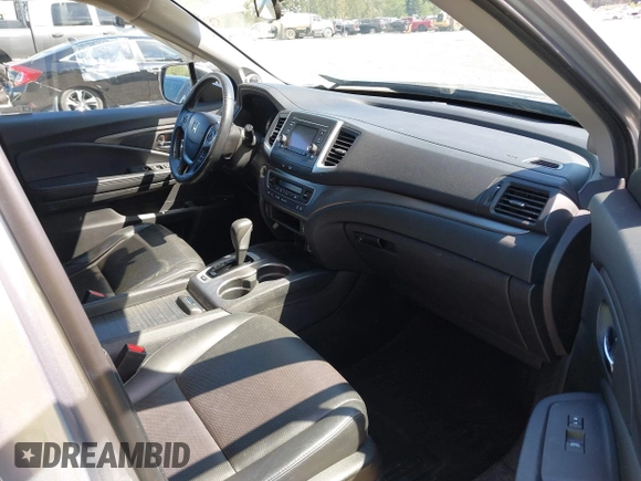 2019 Honda Ridgeline RTL with VIN 5FPYK3F54KB018272, listed as a IAAI auction lot 42184895 with 75,362 mi miles and . Bid and sale history available at DreamBid. Image 5.