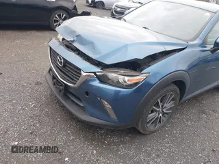2018 Mazda CX-3 Touring with VIN JM1DKFC78J0322460, listed as a IAAI auction lot 41730662 with 58,841 mi miles. Bid and sale history available at carsss.com. Image 6.
