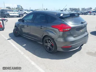 2015 Ford Focus ST with VIN 1FADP3L94FL241243, listed as a IAAI auction lot 41964511 with 97,259 mi miles. Bid and sale history available at carsss.com. Image 3.