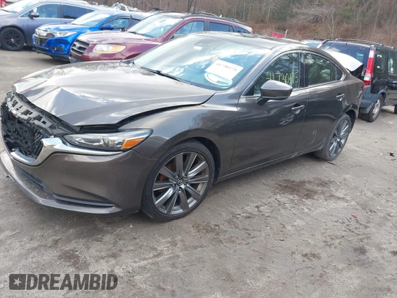 2018 Mazda Mazda6 Touring with VIN JM1GL1VM5J1309174, listed as a IAAI auction lot 41730175 with 107,423 mi miles. Bid and sale history available at carsss.com. Image 16.
