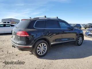 2016 Volkswagen Touareg Sport with VIN WVGEF9BP9GD010964, listed as a Copart auction lot 85800844 with 157,563 mi miles and Salvage Title. Bid and sale history available at DreamBid. Image 3.