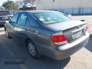2005 Toyota Camry LE with VIN 4T1BF32K35U590150, listed as a IAAI auction lot 41614295 with 180,627 mi miles and . Bid and sale history available at DreamBid. Image 3.