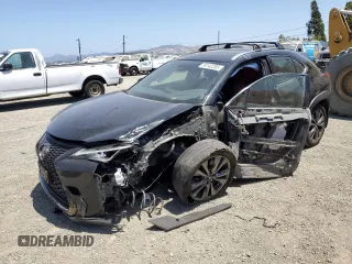 2019 Lexus UX 250h with VIN JTHU9JBH2K2013001, listed as a Copart auction lot 59142205 with 104,917 mi miles and Salvage title. Bid and sale history available at DreamBid. Image 1.