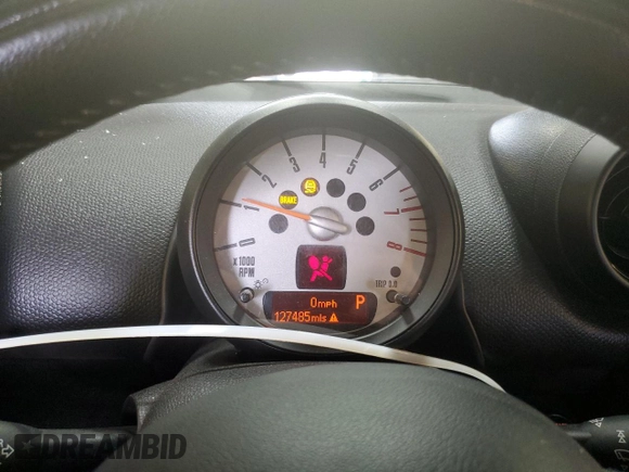 2014 MINI Countryman with VIN WMWZB3C58EWR37237, listed as a Copart auction lot 55596935 with 127,458 mi miles and Salvage Title. Bid and sale history available at DreamBid. Image 9.