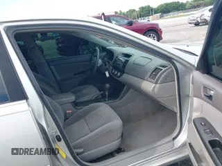 2005 Toyota Camry LE with VIN 4T1BE30K35U572110, listed as a IAAI auction lot 42674324 with 147,480 mi miles and . Bid and sale history available at DreamBid. Image 5.