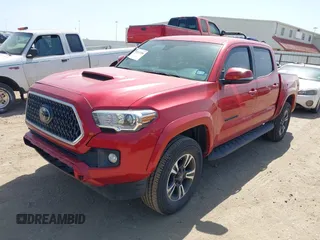 2018 Toyota Tacoma SR5 with VIN 5TFAZ5CN0JX063350, listed as a IAAI auction lot 41829396 with 61,155 mi miles and . Bid and sale history available at DreamBid. Image 18.