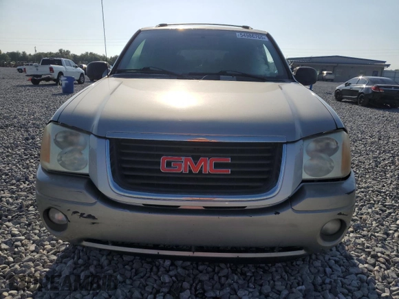 2003 GMC Envoy SLT z VIN 1GKDS13S032373020, wystawiony jako Copart lot #54986765 z przebiegiem 235 711 mil mil oraz Tytuł czysty. Historia ofert i sprzedaży dostępna na DreamBid. Obrazek 5.