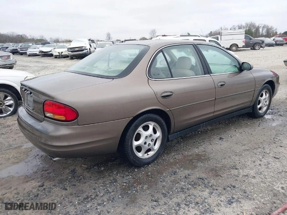 1999 Oldsmobile Intrigue GLS with VIN 1G3WX52H6XF321750, listed as a IAAI auction lot 41505500 with 180,036 mi miles. Bid and sale history available at carsss.com. Image 4.