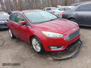 2015 Ford Focus Titanium with VIN 1FADP3N23FL248880, listed as a IAAI auction lot 41474936 with 86,245 mi miles. Bid and sale history available at carsss.com. Image 1.