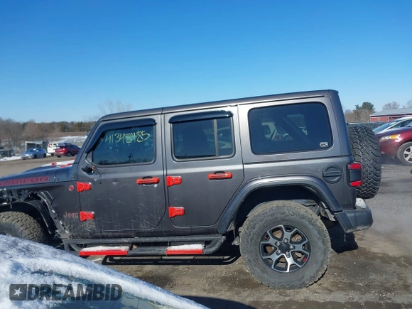 2020 Jeep Wrangler Unlimited Rubicon with VIN 1C4HJXFG3LW291155, listed as a IAAI auction lot 41348485 with 72,481 mi miles and . Bid and sale history available at DreamBid. Image 14.