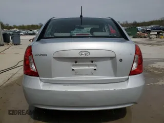 2006 Hyundai Accent GLS with VIN KMHCN46C46U048752, listed as a Copart auction lot 52930035 with 143,688 mi miles and Salvage title. Bid and sale history available at DreamBid. Image 6.