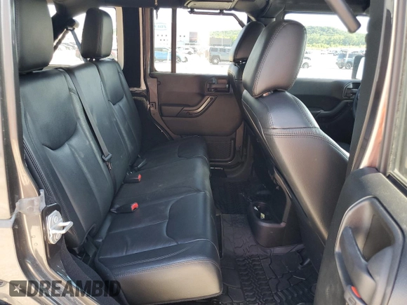 2017 Jeep Wrangler Unlimited Sahara with VIN 1C4BJWEG0HL727423, listed as a Copart auction lot 56719285 with 62,965 mi miles and Salvage title. Bid and sale history available at DreamBid. Image 11.