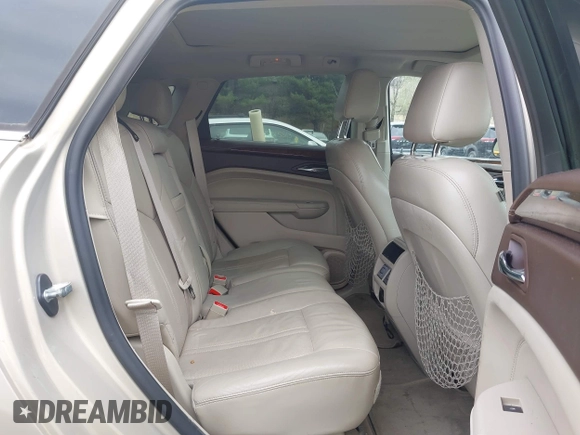 2011 Cadillac SRX Luxury Collection with VIN 3GYFNAEY4BS663447, listed as a IAAI auction lot 42134933 with 153,411 mi miles and . Bid and sale history available at DreamBid. Image 8.