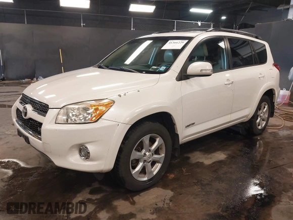 2011 Toyota RAV4 Ltd with VIN 2T3DK4DV0BW037542, listed as a IAAI auction lot 41366229 with 104,607 mi miles. Bid and sale history available at carsss.com. Image 2.