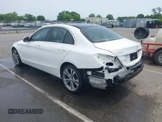 2016 Mercedes-Benz C 300 with VIN 55SWF4JB8GU096616, listed as a IAAI auction lot 42281665 with 104,838 mi miles and . Bid and sale history available at DreamBid. Image 3.
