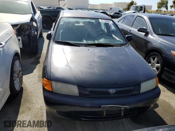 1997 Mazda Protege DX z VIN JM1BC1412V0157268, wystawiony jako Copart lot #61380564 z przebiegiem 85 356 mil mil oraz Szkoda całkowita • Salvage title. Historia ofert i sprzedaży dostępna na DreamBid. Obrazek 5.