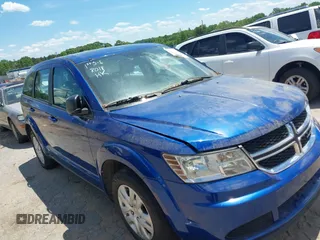 2015 Dodge Journey American Value z VIN 3C4PDCAB4FT530181, wystawiony jako IAAI lot #42208018 z przebiegiem Nie podano mil oraz . Historia ofert i sprzedaży dostępna na DreamBid. Obrazek 1.