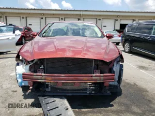 2014 Ford Fusion SE Hybrid with VIN 3FA6P0LU3ER253735, listed as a Copart auction lot 63222635 with 147,470 mi miles and Salvage title. Bid and sale history available at DreamBid. Image 5.
