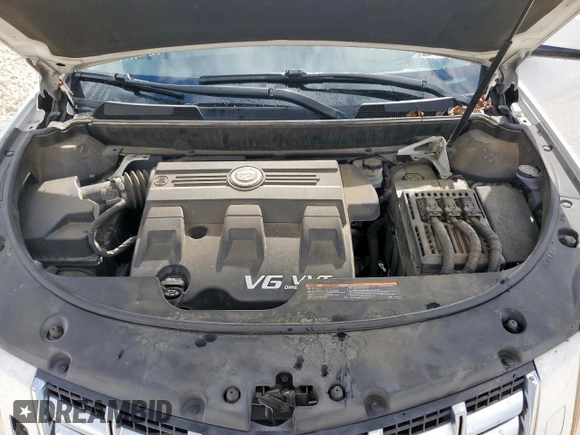 2014 Cadillac SRX Performance Collection with VIN 3GYFNCE39ES687733, listed as a Copart auction lot 62770665 with 151,714 mi miles and Salvage title. Bid and sale history available at DreamBid. Image 12.