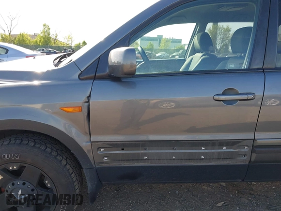 2008 Honda Pilot VP with VIN 5FNYF18208B008772, listed as a IAAI auction lot 42098599 with 186,981 mi miles and . Bid and sale history available at DreamBid. Image 12.
