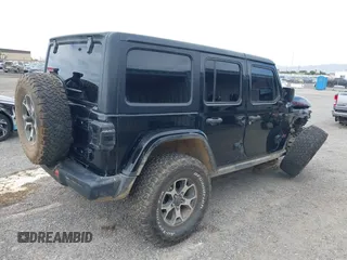 2022 Jeep Wrangler Unlimited Rubicon with VIN 1C4HJXFN2NW134024, listed as a IAAI auction lot 42248188 with 41,899 mi miles and . Bid and sale history available at DreamBid. Image 4.