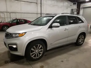 2012 Kia Sorento SX z VIN 5XYKWDA2XCG283312, wystawiony jako Copart lot #59534255 z przebiegiem 128 468 mil mil oraz Szkoda całkowita • Salvage title. Historia ofert i sprzedaży dostępna na DreamBid. Obrazek 1.