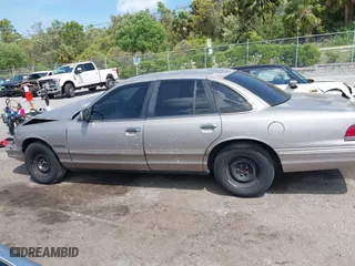1995 Ford Crown Victoria with VIN 2FALP73W5SX140346, listed as a IAAI auction lot 41974429 with 166,540 mi miles. Bid and sale history available at carsss.com. Image 14.
