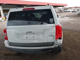 2014 Jeep Patriot High Altitude with VIN 1C4NJPFA0ED667162, listed as a IAAI auction lot 41752271 with 131,038 mi miles and . Bid and sale history available at carsss.com. Image 6.