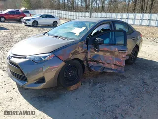 2019 Toyota Corolla L with VIN 5YFBURHE9KP941246, listed as a IAAI auction lot 41674752 with 128,548 mi miles. Bid and sale history available at carsss.com. Image 18.