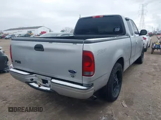 2002 Ford F-150 XL with VIN 1FTRX17212NA45843, listed as a IAAI auction lot 41575856 with 136,570 mi miles. Bid and sale history available at carsss.com. Image 4.