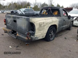 1998 Dodge Dakota SLT with VIN 1B7FL26X6WS656704, listed as a IAAI auction lot 41418285 with Not provided miles and . Bid and sale history available at DreamBid. Image 4.