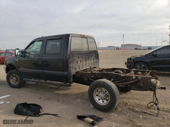 2003 Ford Super Duty F-350 SRW XL with VIN 1FTSW31F33EB26520, listed as a Copart auction lot 76311114 with 217,421 mi miles and Salvage Title. Bid and sale history available at carsss.com. Image 2.