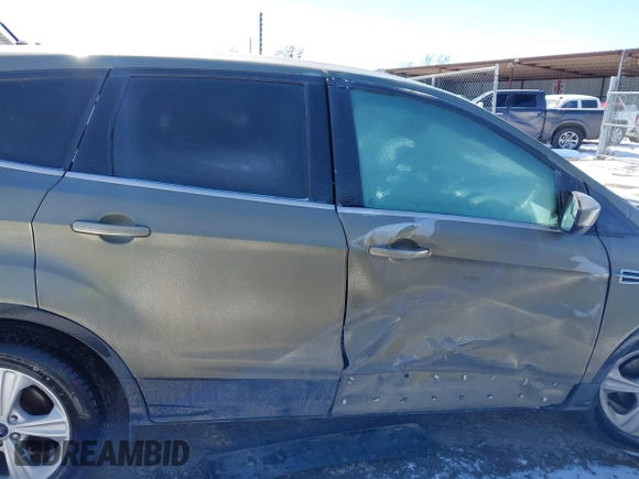 2013 Ford Escape SE with VIN 1FMCU0GX4DUC60741, listed as a IAAI auction lot 41592770 with 121,972 mi miles and . Bid and sale history available at DreamBid. Image 13.