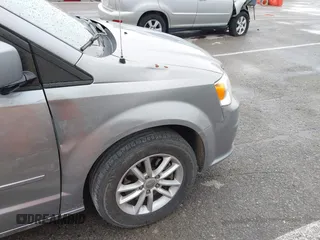 2016 Dodge Grand Caravan SXT with VIN 2C4RDGCG3GR321933, listed as a IAAI auction lot 41895209 with 186,502 mi miles and . Bid and sale history available at DreamBid. Image 17.