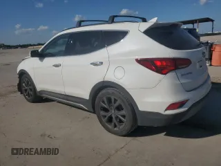 2018 Hyundai Santa Fe Ultimate z VIN 5XYZW4LA6JG566242, wystawiony jako Copart lot #54324655 z przebiegiem 125 543 mil mil oraz Szkoda całkowita • Salvage title. Historia ofert i sprzedaży dostępna na DreamBid. Obrazek 2.