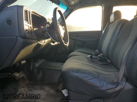 2000 Chevrolet Silverado 1500 with VIN 2GCEC19WXY1113447, listed as a Copart auction lot 77107304 with 242,406 mi miles and Salvage Title. Bid and sale history available at DreamBid. Image 7.