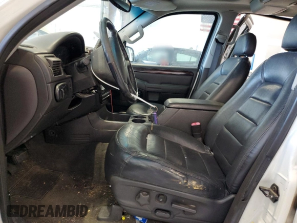 2004 Ford Explorer Limited с VIN 1FMDU75W84ZA63498, выставлен на аукционе Copart как лот 56377655 с пробегом 156 305 миль миль и Списание • Salvage title. История ставок и продаж доступна на DreamBid. Изображение 7.