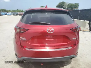 2018 Mazda CX-5 Grand Touring with VIN JM3KFADM4J1395832, listed as a Copart auction lot 66464915 with 41,410 mi miles and Salvage title. Bid and sale history available at DreamBid. Image 6.