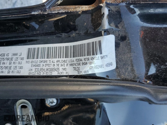 2019 Ram 2500 Tradesman with VIN 3C6UR5HL0KG665425, listed as a Copart auction lot 77187034 with 82,569 mi miles and Salvage title. Bid and sale history available at DreamBid. Image 12.