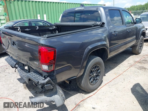 2021 Toyota Tacoma SR z VIN 3TMCZ5AN2MM392590, wystawiony jako IAAI lot #42178072 z przebiegiem 42 542 mil mil oraz . Historia ofert i sprzedaży dostępna na DreamBid. Obrazek 4.