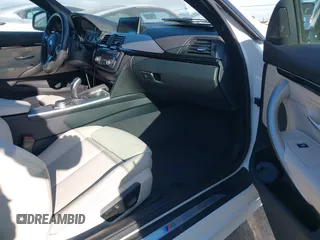 2015 BMW 4 Series 428i with VIN WBA3N7C55FK224583, listed as a IAAI auction lot 41870399 with 29,910 mi miles. Bid and sale history available at carsss.com. Image 5.