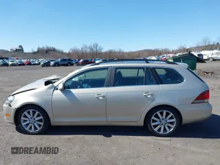 2014 Volkswagen Jetta SportWagen TDI with VIN 3VWPL7AJ8EM610672, listed as a IAAI auction lot 41811091 with 129,554 mi miles. Bid and sale history available at carsss.com. Image 14.