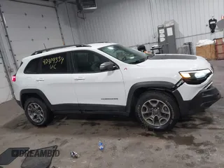 2021 Jeep Cherokee Trailhawk with VIN 1C4PJMBX8MD139644, listed as a IAAI auction lot 42419334 with 68,333 mi miles and . Bid and sale history available at DreamBid. Image 13.