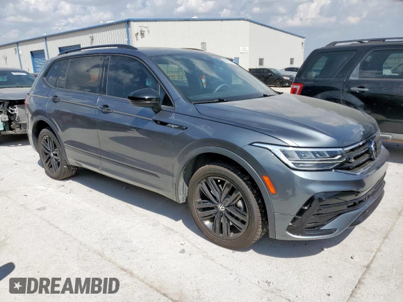 2022 Volkswagen Tiguan SE R-Line Black with VIN 3VVCB7AX6NM065002, listed as a Copart auction lot 50376425 with 30,408 mi miles and Salvage Title. Bid and sale history available at DreamBid. Image 4.