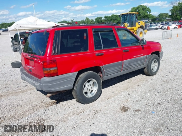 1998 Jeep Grand Cherokee Laredo with VIN 1J4FX58S9WC137514, listed as a IAAI auction lot 42305247 with 228,669 mi miles and . Bid and sale history available at DreamBid. Image 4.